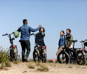 friends taking a break from an ebike adventure
